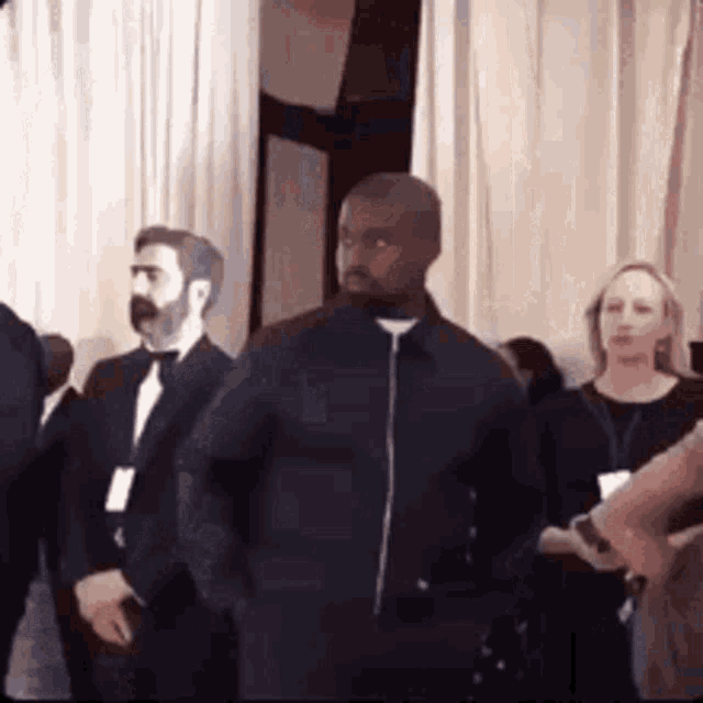 fake-smile-kanye-west.gif.e1c59d9197e4358642f48fbd269682ce.gif